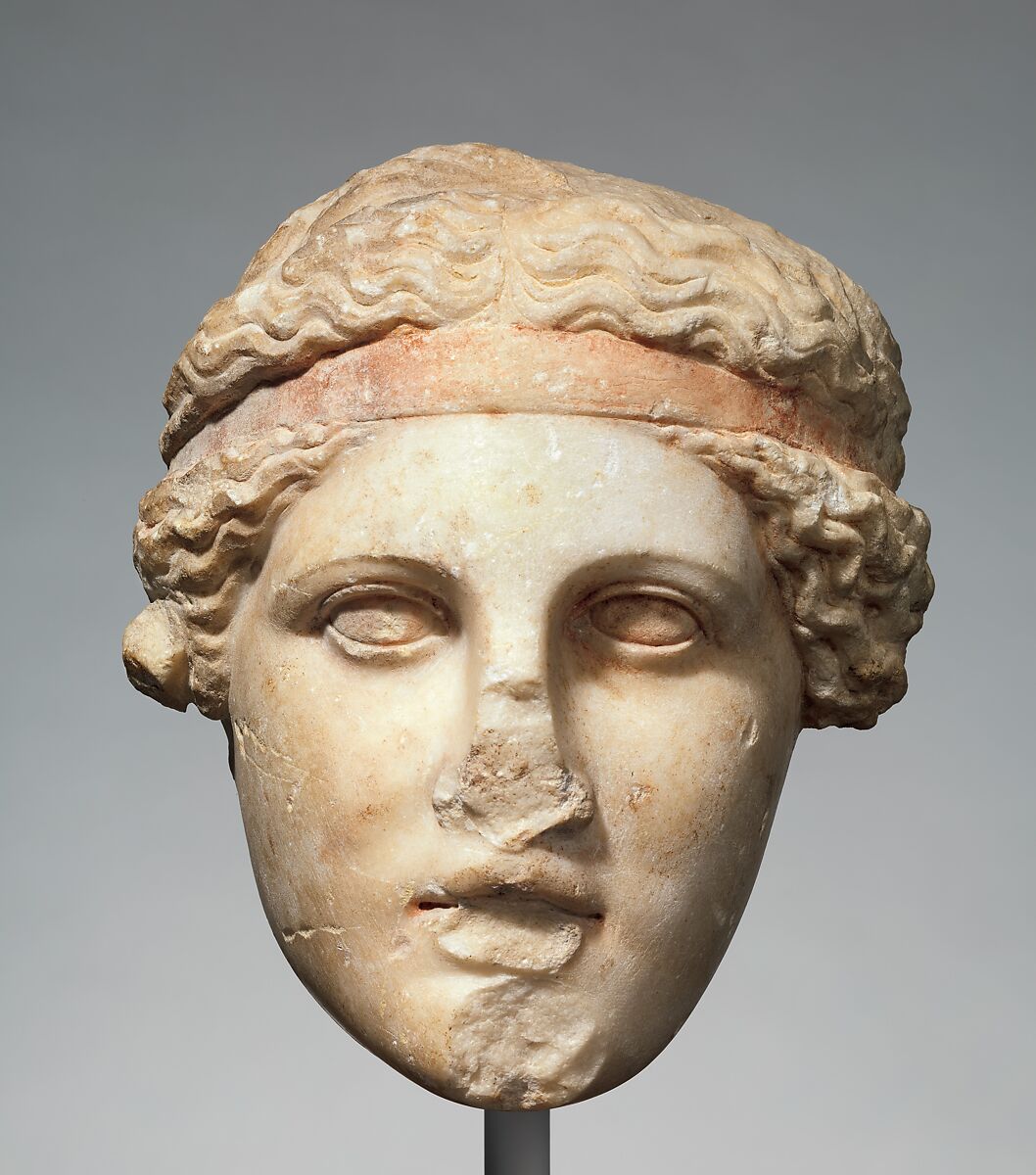 Marble head of a deity wearing a Dionysiac fillet, Marble, Roman