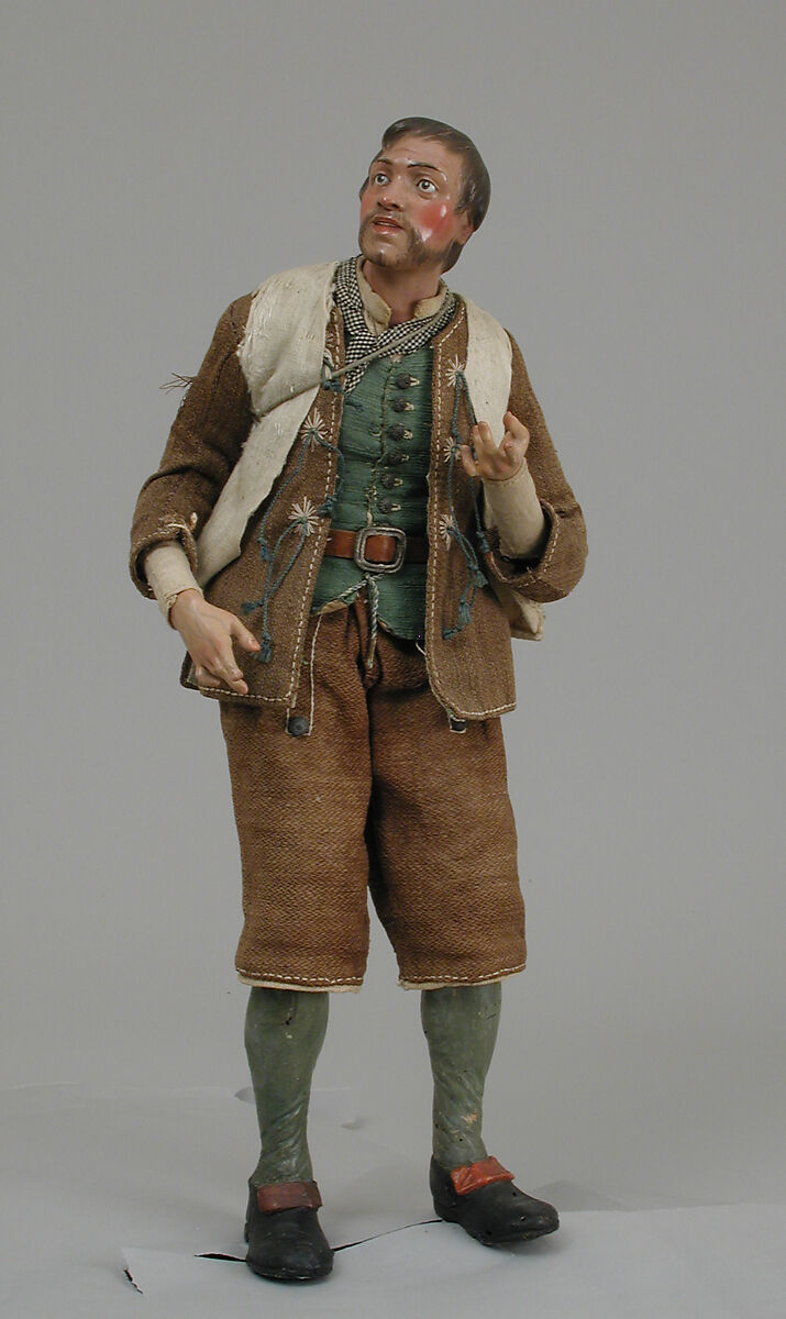 Man with bagpipes, Polychromed terracotta and wood; straw, cloth, metal and leather