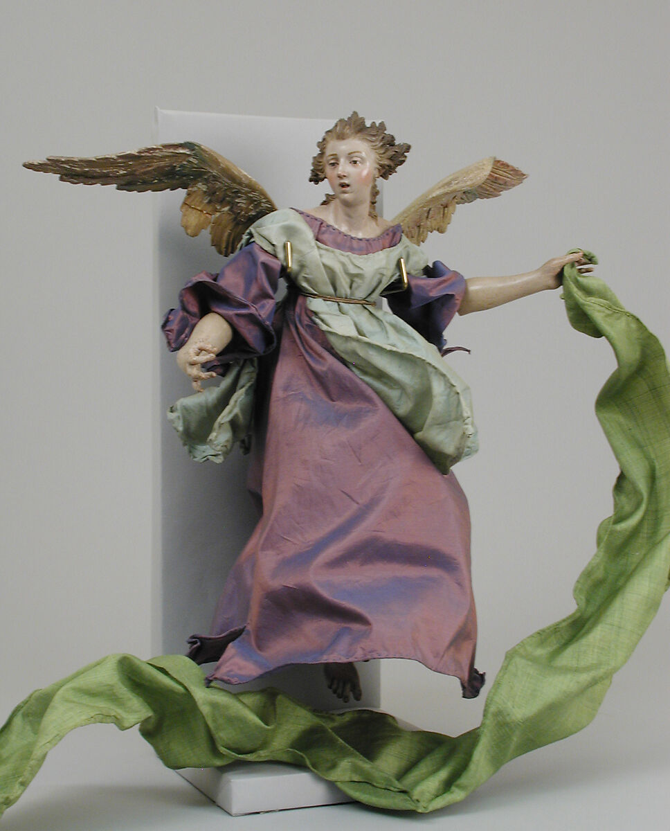 Angel, Polychromed terracotta head; wooden limbs and wings; body of wire wrapped in tow; various fabrics.