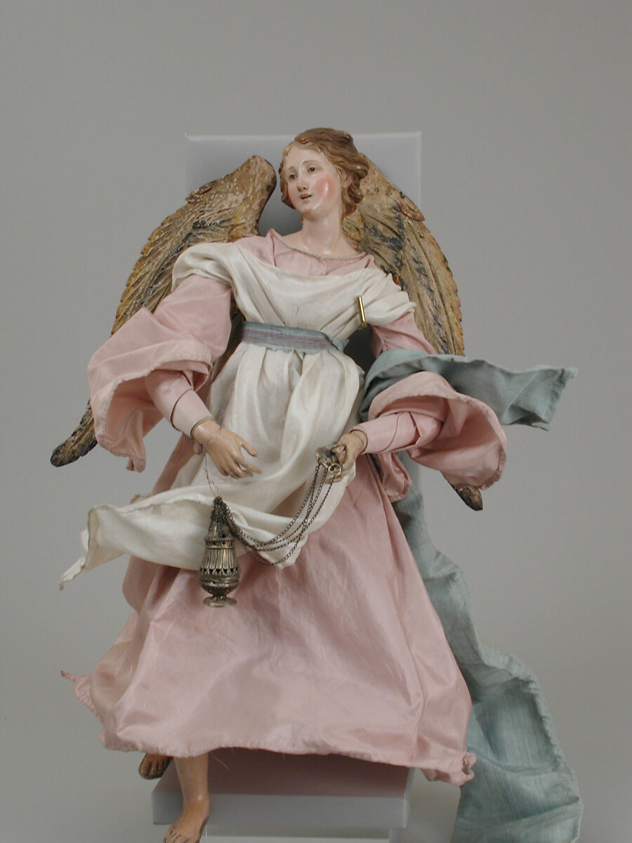 Angel, Polychromed terracotta head; wooden limbs and wings; body of wire wrapped in tow; various fabrics