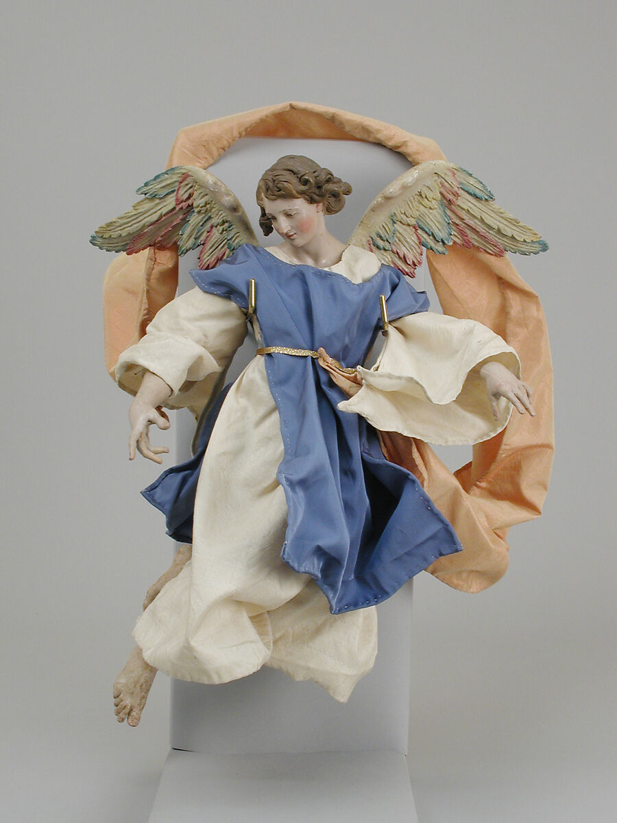 Angel, Polychromed terracotta head; wooden limbs and wings; body of wire wrapped in tow; silk garments