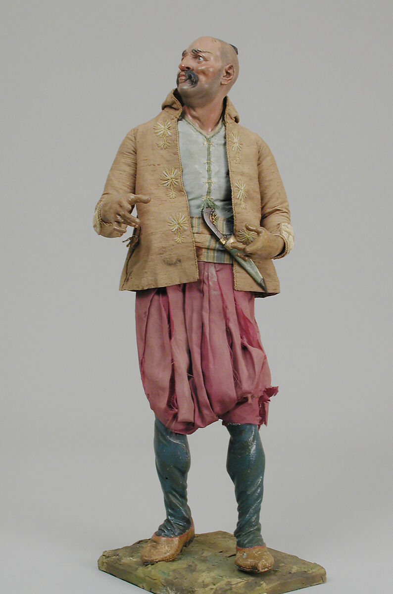 King's attendant, Lorenzo Mosca, Polychromed terracotta head and wooden limbs; body of wire wrapped in tow; silk and satin garments with silver and gold metallic thread; dagger with silver blade and gold cross guard in paper sheath