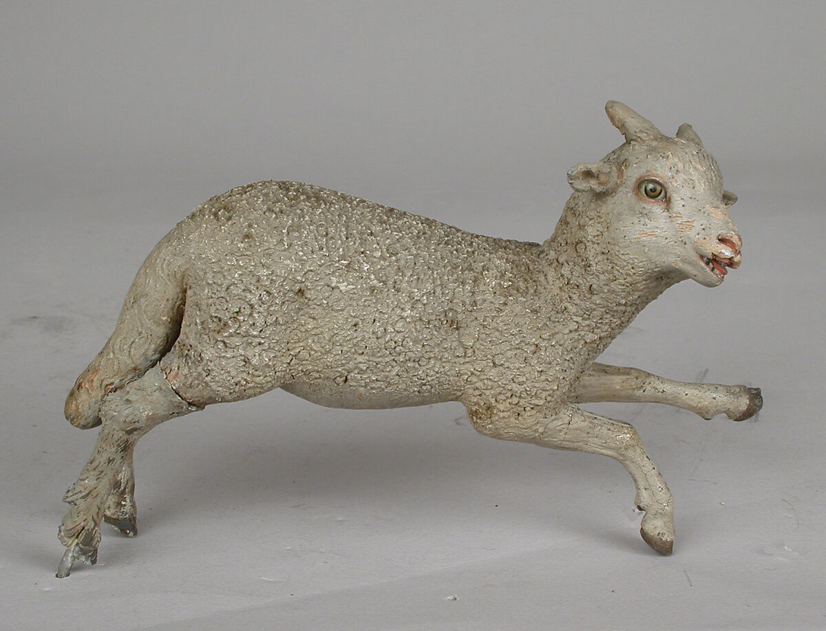 Lamb, Polychromed terracotta body, lead legs and ears, wooden base and tree