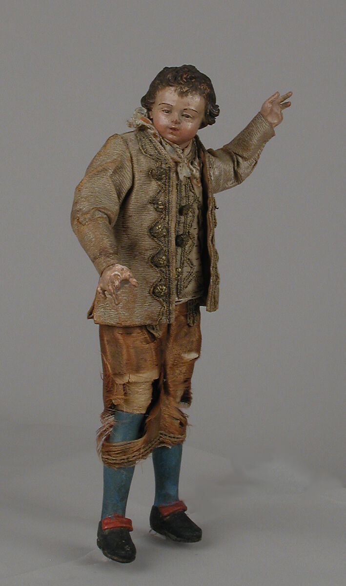 Boy, Polychromed terracotta head and wooden limbs; body of wire wrapped in tow; various fabrics; silver and metallic thread; leather hat with silk lining