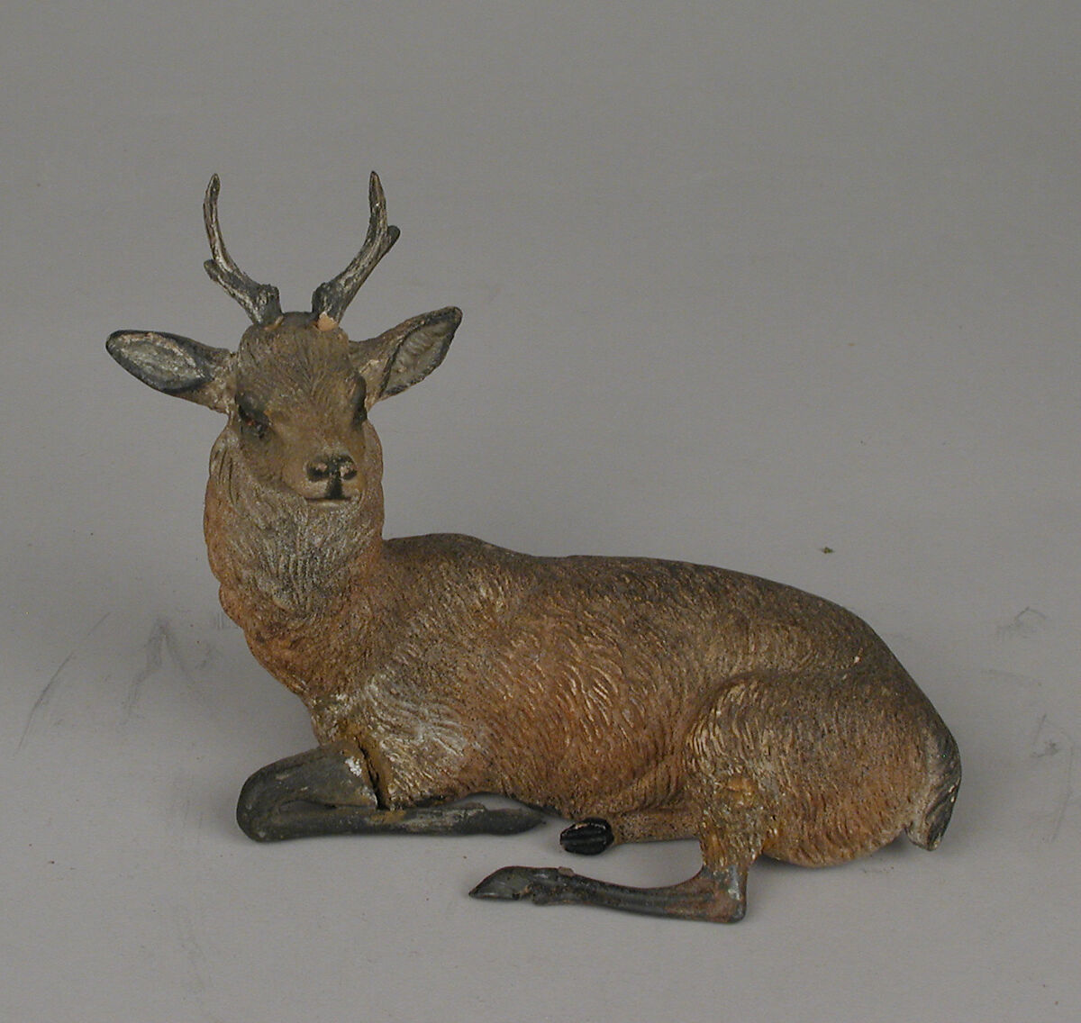 Recumbent deer, Polychromed terracotta