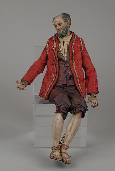 Seated man, Polychromed terracotta head; wooden limbs; body of wire wrapped in tow; linen and silk garments; glass eyes