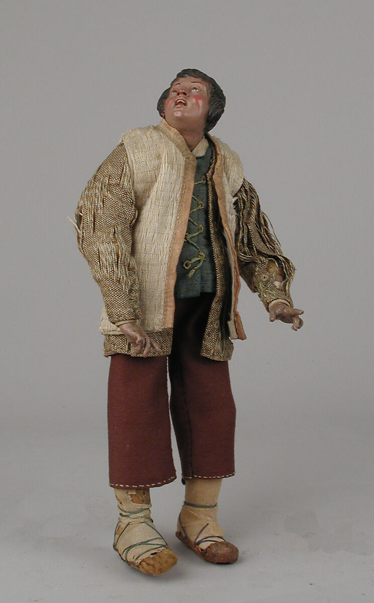 Standing shepherd, Polychromed terracotta head; wooden limbs; body of wire wrapped in tow; cloth garments and leather hat