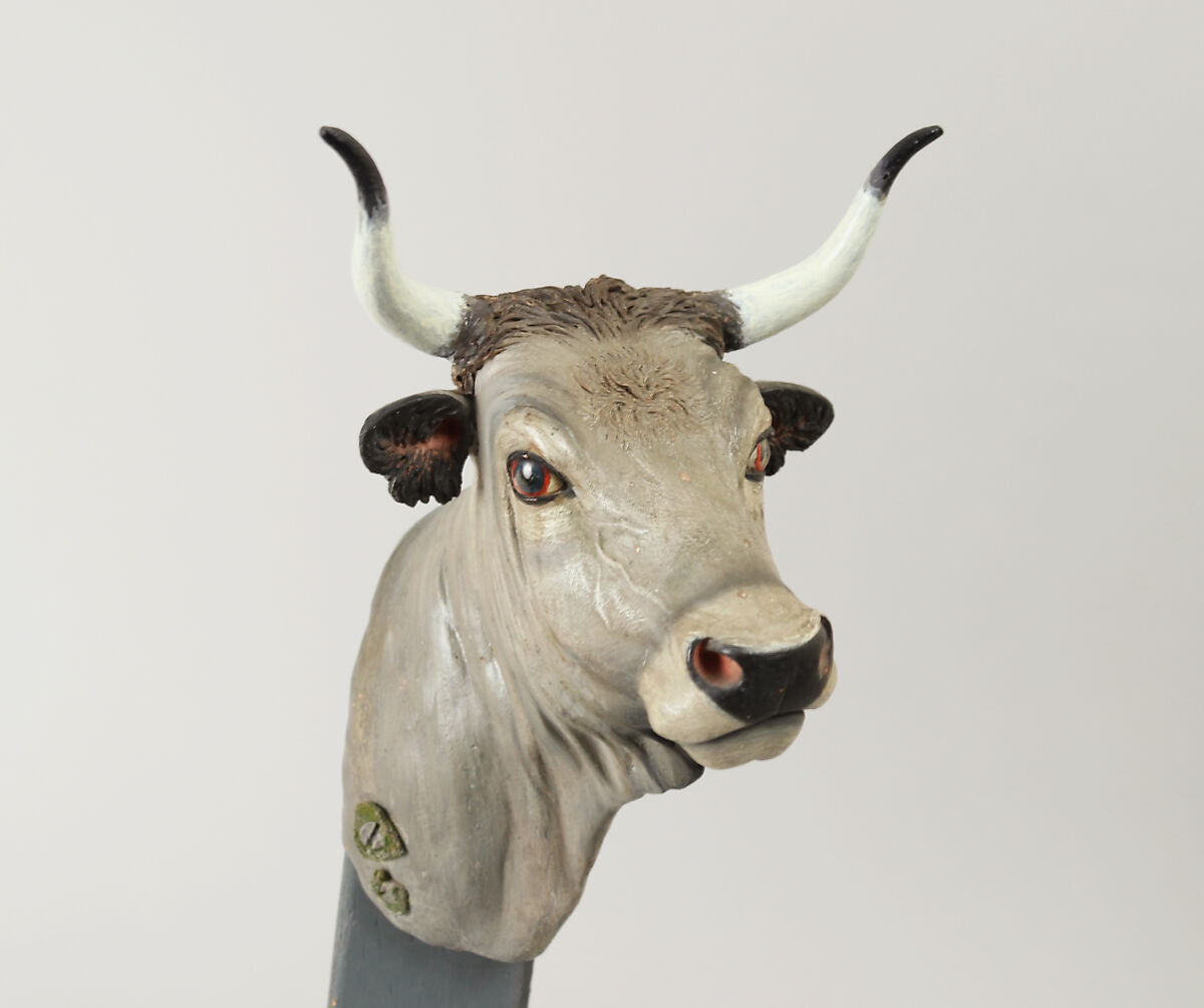 Cow's head, Polychromed terracotta body and wooden horns