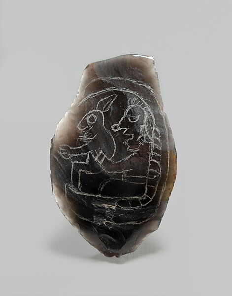 Incised flake with deity image
, Obsidian, Maya
