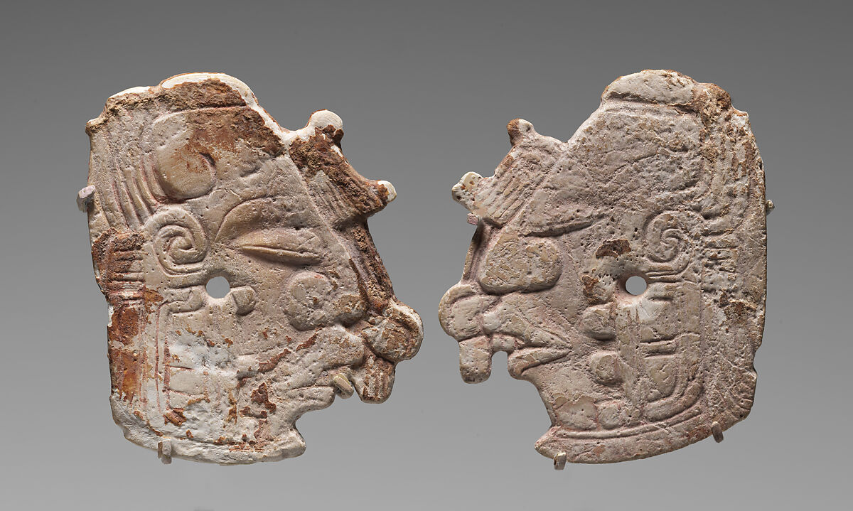 Pair of carved ornaments with the Maize God, Shell, Maya