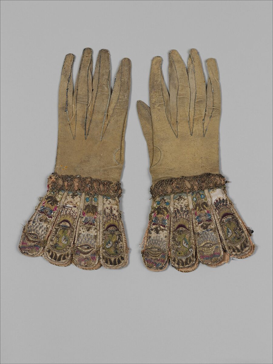 Pair of gloves, Leather, satin worked with silk and precious metal thread, seed pearls; satin, couching, and darning stitches; metal bobbin lace; paper