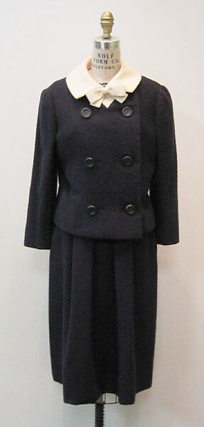 Suit, Mainbocher (French and American, founded 1930), a) wool, silk, plastic (cellulose nitrate); b) wool, synthetic fiber, American 