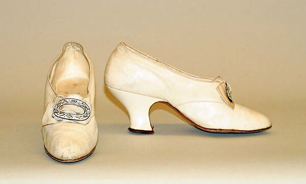 Wedding ensemble, Flaven (American), a) silk, wax
b,c) leather, metal, silk
d) wax, American