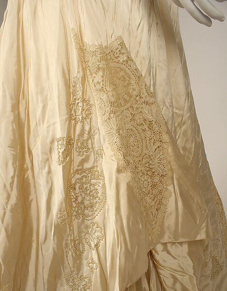 Wedding ensemble, Flaven (American), a) silk, wax
b,c) leather, metal, silk
d) wax, American