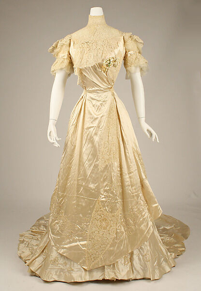 Wedding ensemble, Flaven (American), a) silk, wax
b,c) leather, metal, silk
d) wax, American 