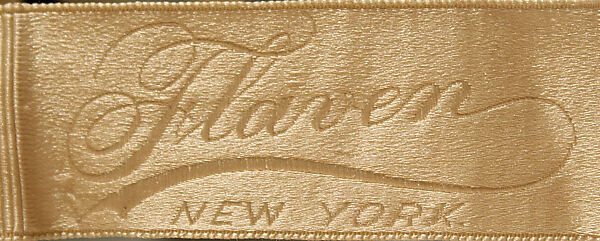 Wedding ensemble, Flaven (American), a) silk, wax
b,c) leather, metal, silk
d) wax, American