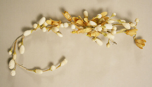 Wedding ensemble, Flaven (American), a) silk, wax
b,c) leather, metal, silk
d) wax, American