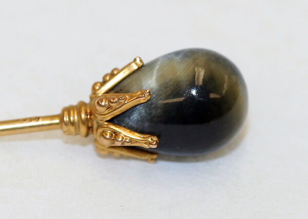Stickpin, gold, tigereye, American or European