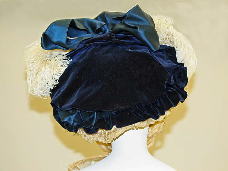 Ensemble, (a, b) wool, silk, fur
(c) silk, feather, French