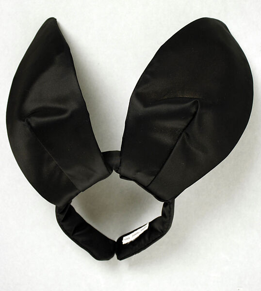 "Bunny Costume", Playboy (American), a) nylon, synthetic fiber, cotton; b, c) synthetic fiber; d,e) cotton; f,g) metal; h) silk, synthetic; i) plastic, foam; j) synthetic fiber; k, l) brass; m) cotton; n) silk, American