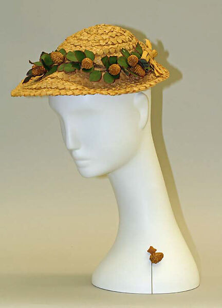 Hat, a) cellulose, straw
b) straw, metal, American 