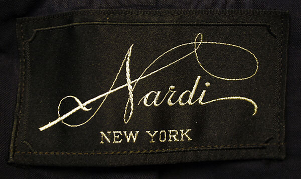 Ensemble, Nardi, Inc., (a, b) wool, silk, metal
(c) straw, silk, American