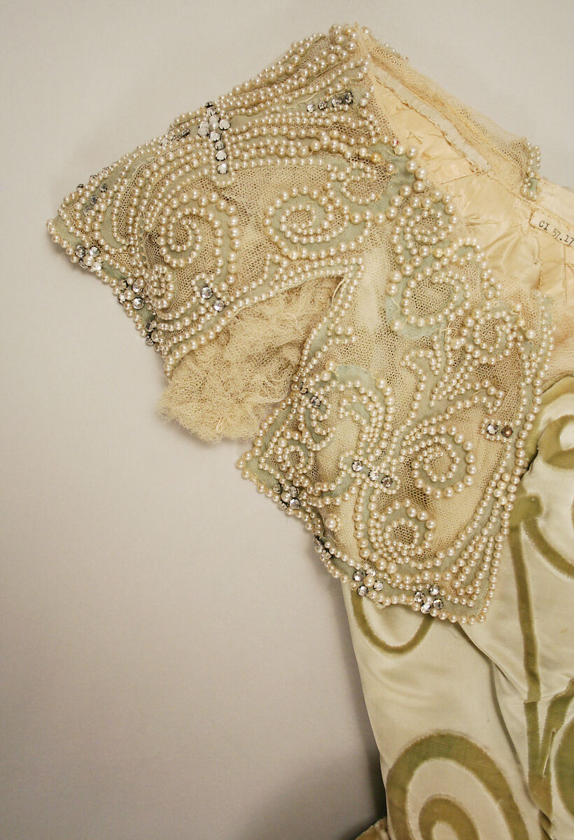 Ensemble, (a, b) House of Worth (French, 1858–1956), (a, b) silk, simulated pearls, rhinestones
(c, d) silk, wood, metal, rhinestones, French