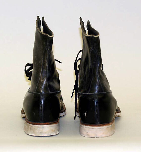 Cycling shoes, leather, rubber, probably American