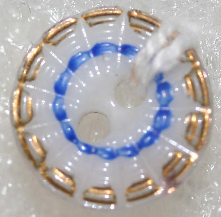 Button, porcelain, American or European