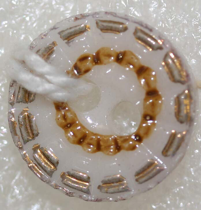 Button, porcelain, American or European