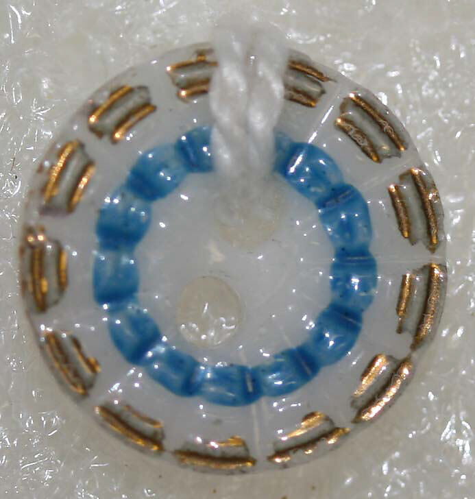 Button, porcelain, American or European