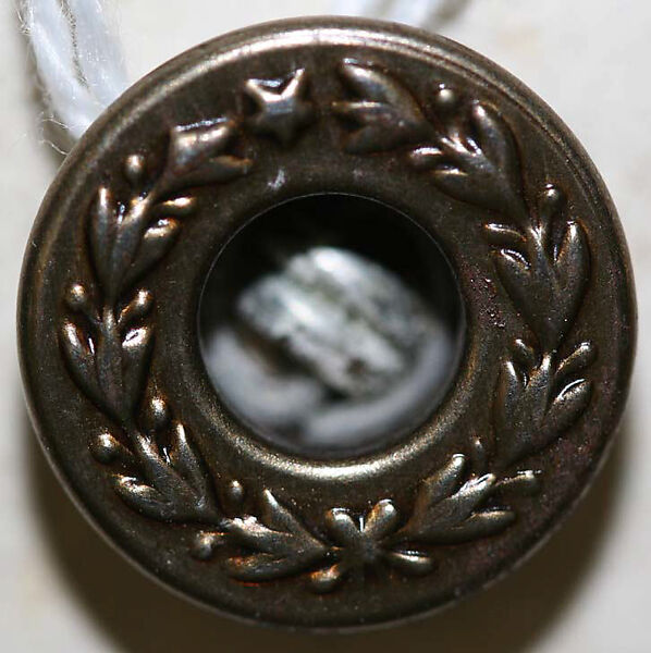 Button, metal, American or European