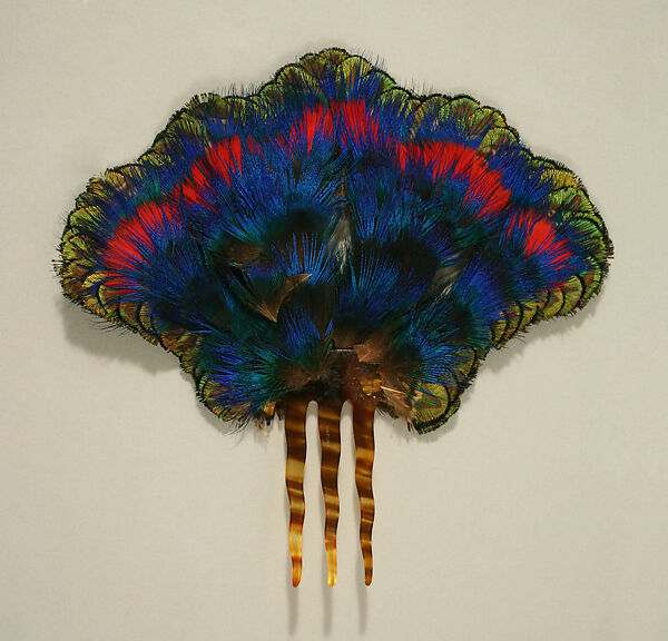 Comb, feathers, plastic, American or European