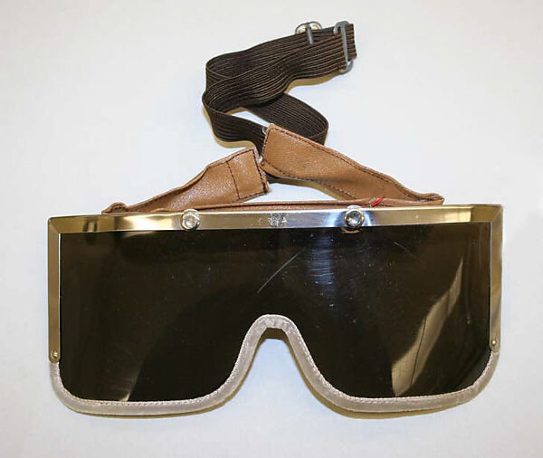 Ski goggles, plastic (cellulose nitrate, polyvinyl acetate), cellulosic fibers, metal, American 