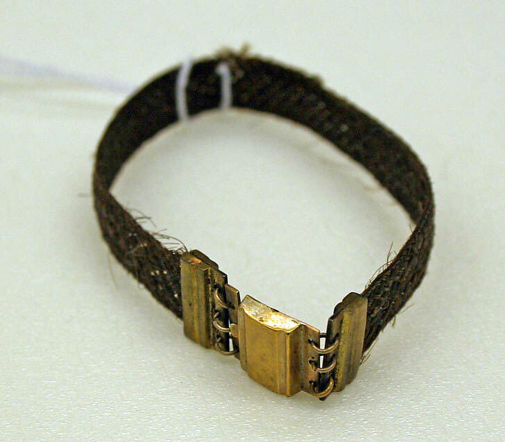 Accessory set, (a), (b) tortoise shell, metal
(c) leather, silk
(d) hair, metal, American