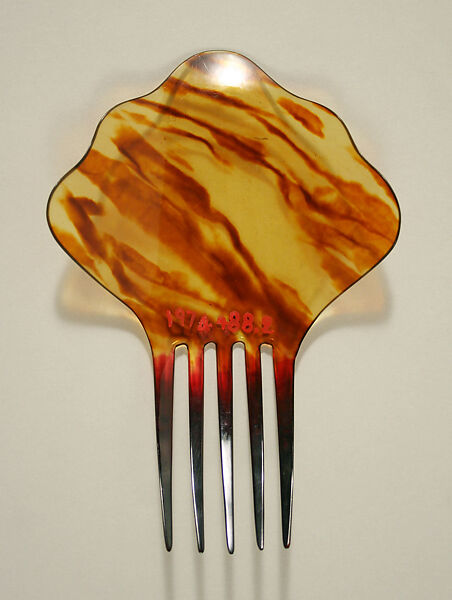 Comb, plastic (cellulose nitrate), American or European