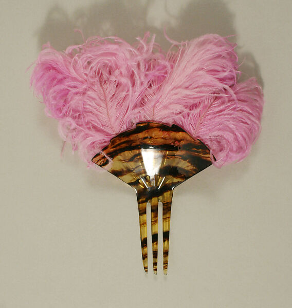 Comb, plastic (cellulose nitrate), feathers, American or European