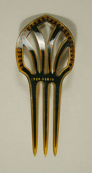 Comb, plastic (cellulose nitrate), glass, American or European