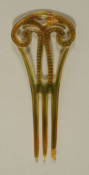 Comb, plastic (cellulose nitrate), glass, American or European