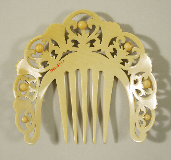 Comb, plastic (cellulose nitrate), probably American