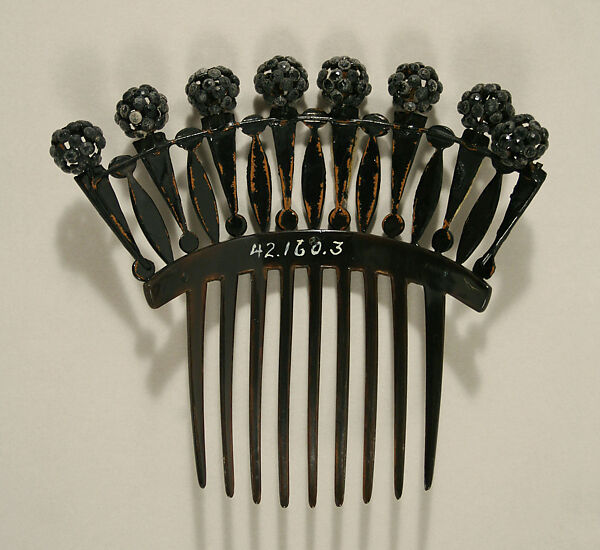 Comb, plastic (cellulose nitrate), jet, American