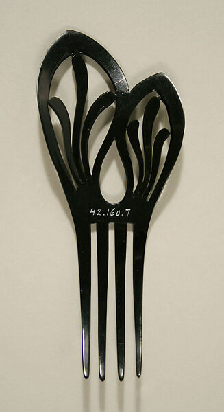 Comb, plastic (cellulose nitrate), jet, American