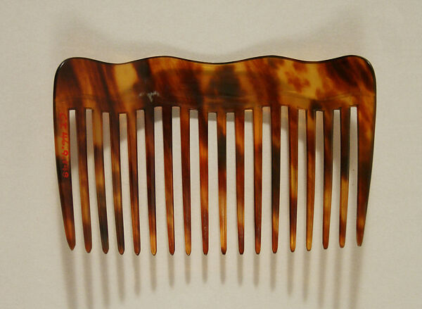 Side comb, plastic (cellulose nitrate), probably American
