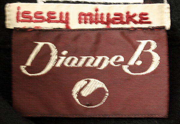 Ensemble, Issey Miyake (Japanese, 1938–2022), a,b) wool, plastic, Japanese