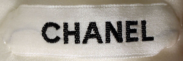 Evening dress, House of Chanel (French, founded 1910), cotton, silk, feathers, plastic, French