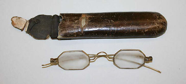 Eyeglasses, (a) glass, metal
(b) imitation leather, American or European 