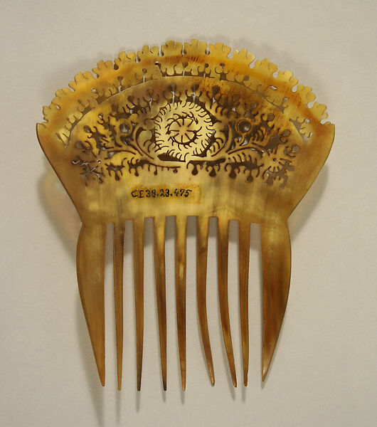 Comb, plastic (cellulose nitrate), American or European
