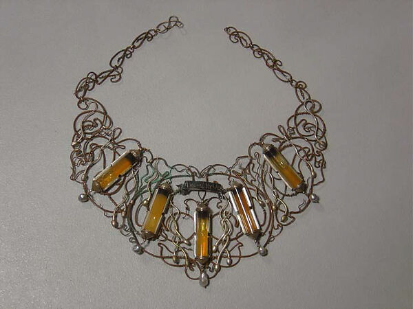 "Incubus", Simon Costin (British, born 1963), a) silver, copper, glass, baroque pearls and human sperm; b) paper, laminate, silk, British