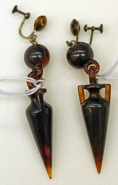 Earrings, tortoiseshell, American or European 