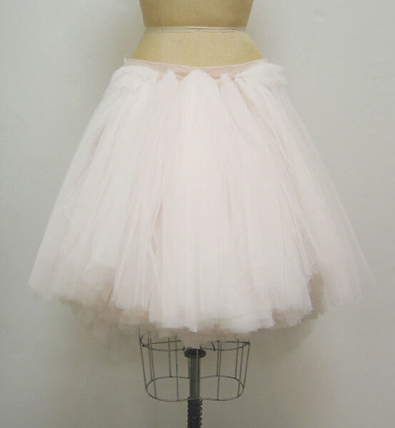 "Remote Control", Hussein Chalayan (British, born Cyprus, 1970), a,c) fiberglass, metal; b) cotton, synthetic, British